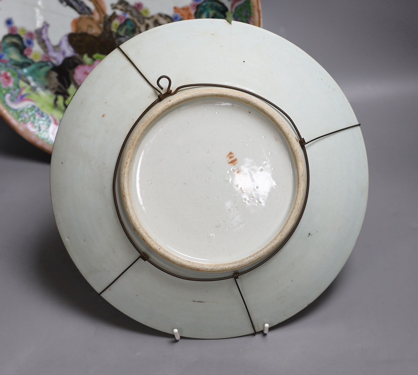 Two Chinese Republic period famille rose dishes, damaged, largest 33cm